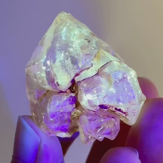 Firefly Petroleum Quartz | UV reactive crystal, fluorescent mineral from Madagascar